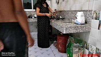 Young Indian girl in black dress gets intimate with husband in kitchen